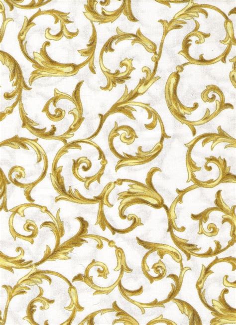 gold metalic fabric|white fabric with gold accents.